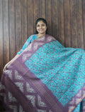 Budget Friendly Saree SLM-BFR-0030 - Turquoise floral print with a purple border - front view