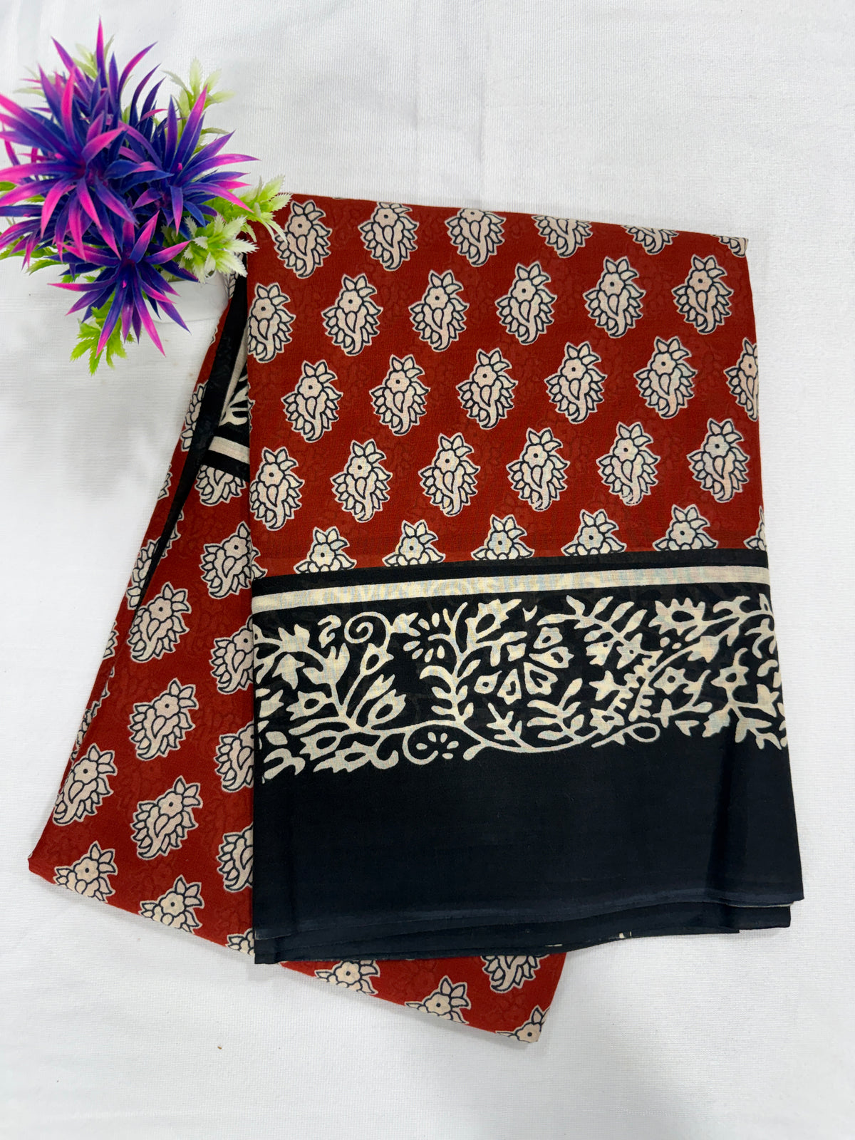 Cotton Saree SLM-CTN-0021 - Brick red with a black and cream border print