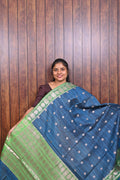 Function Wear Saree SLM-FWR-0026 - Teal blue with polka butta motifs and a green border - front view