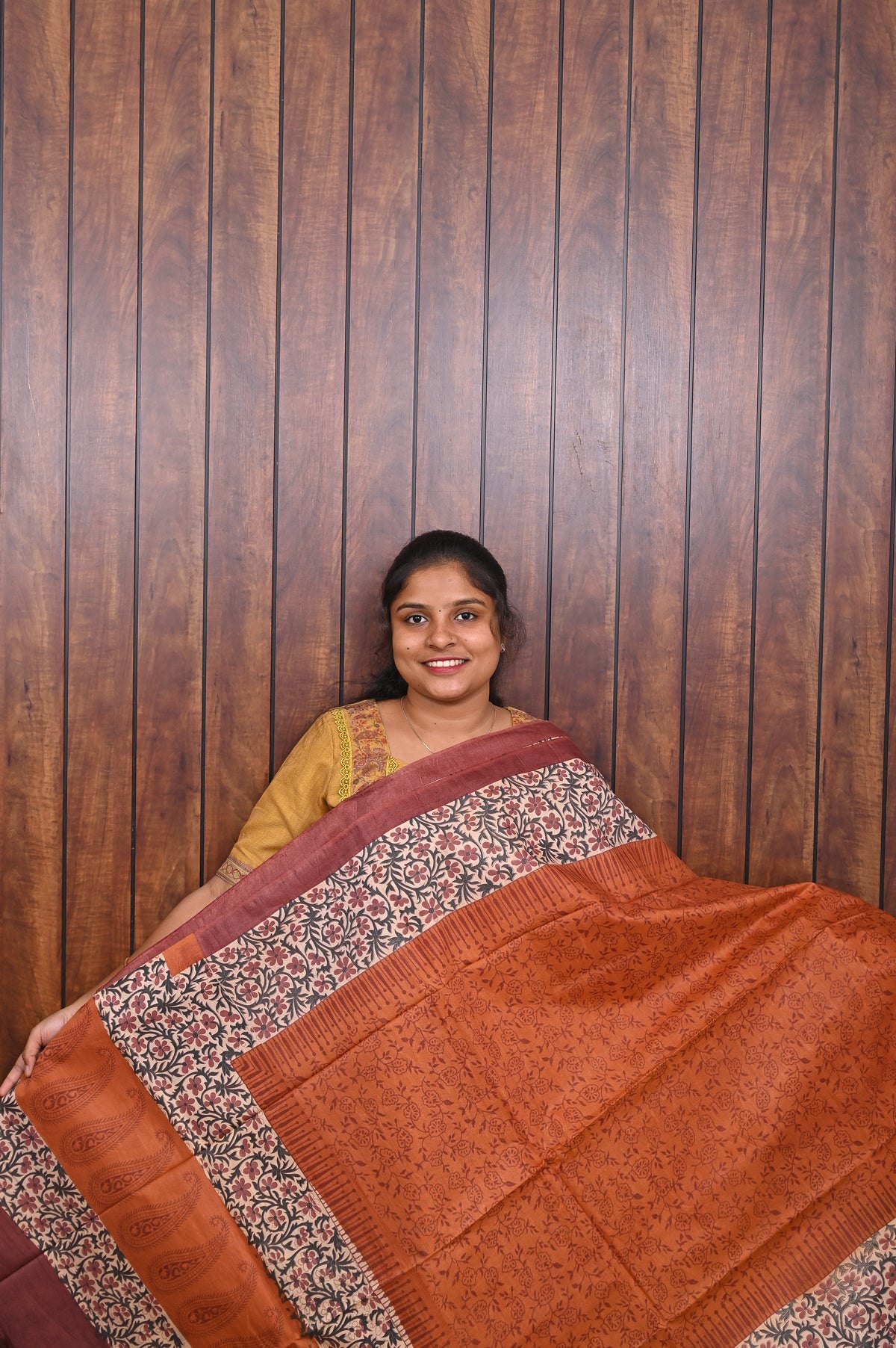 Semi Tussar Saree SLM-STS-0016 - Rust orange with a printed floral border - front view
