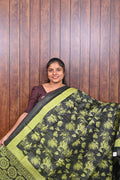 Semi Tussar Saree SLM-STS-0046 - Black with lime green floral print and a lime border - front view