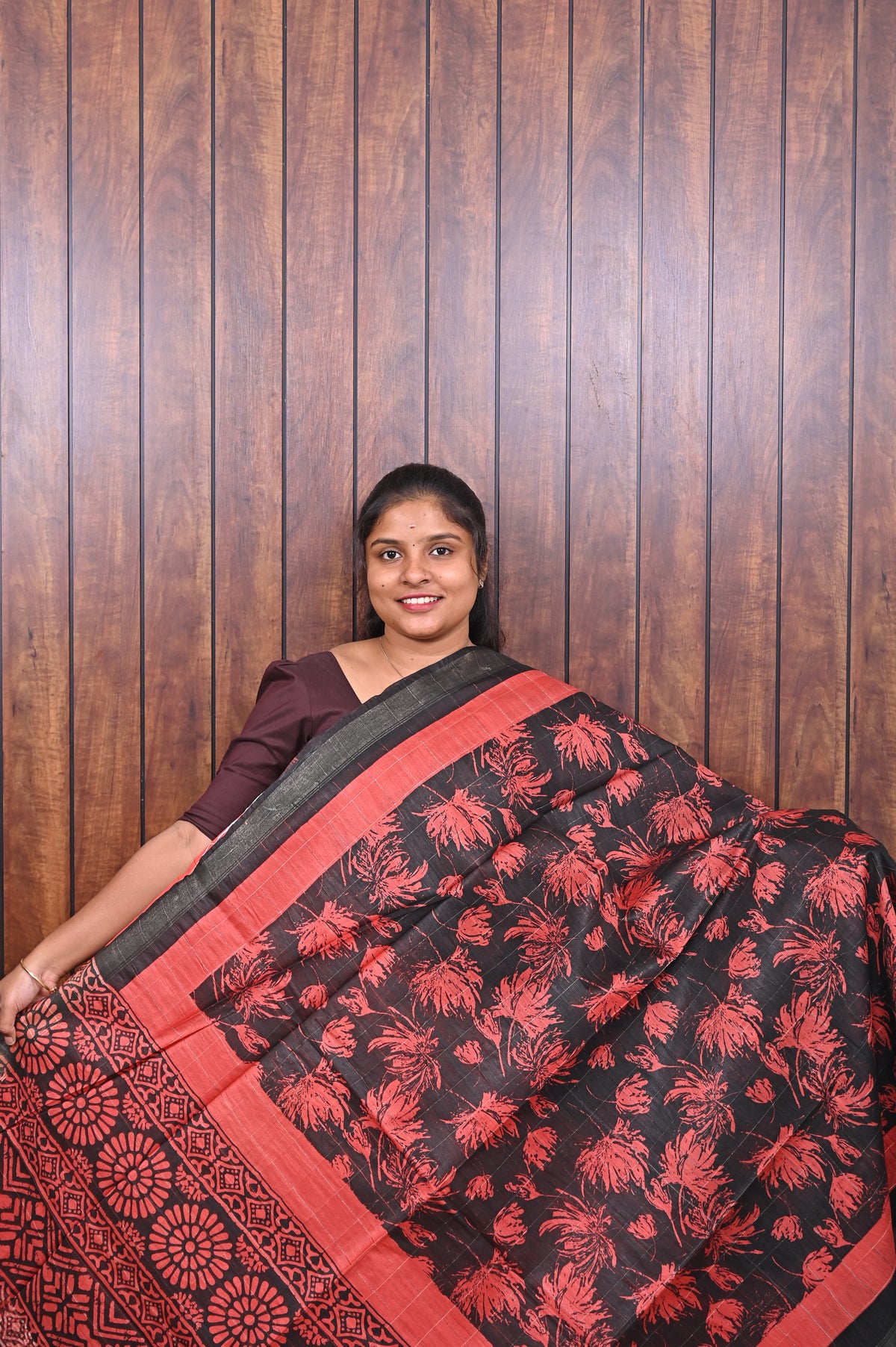Semi Tussar Saree SLM-STS-0047 - Black with coral floral print and a coral border - front view