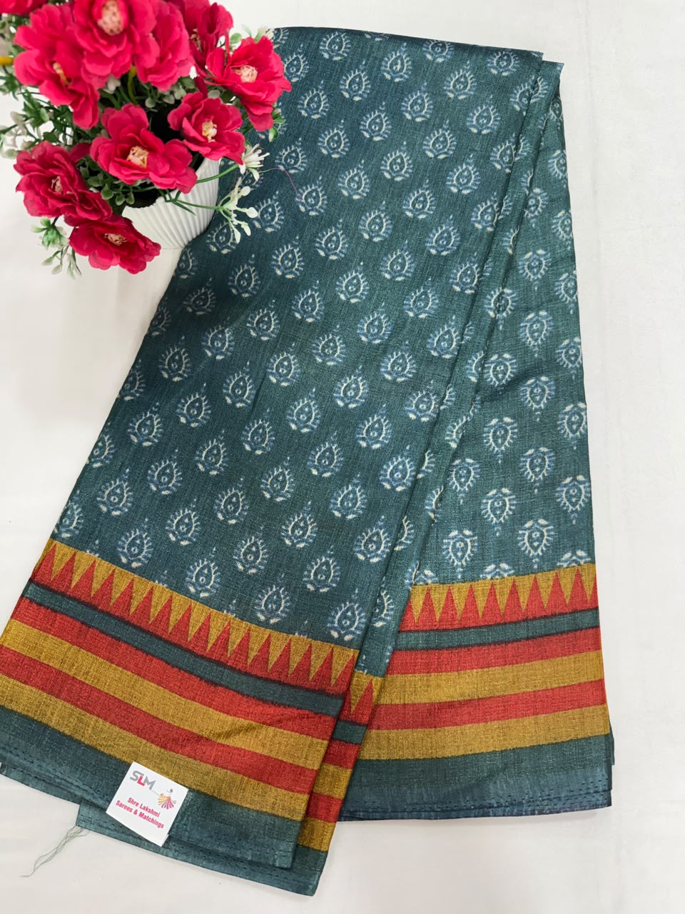Teal green paisley block print saree close-up print and border