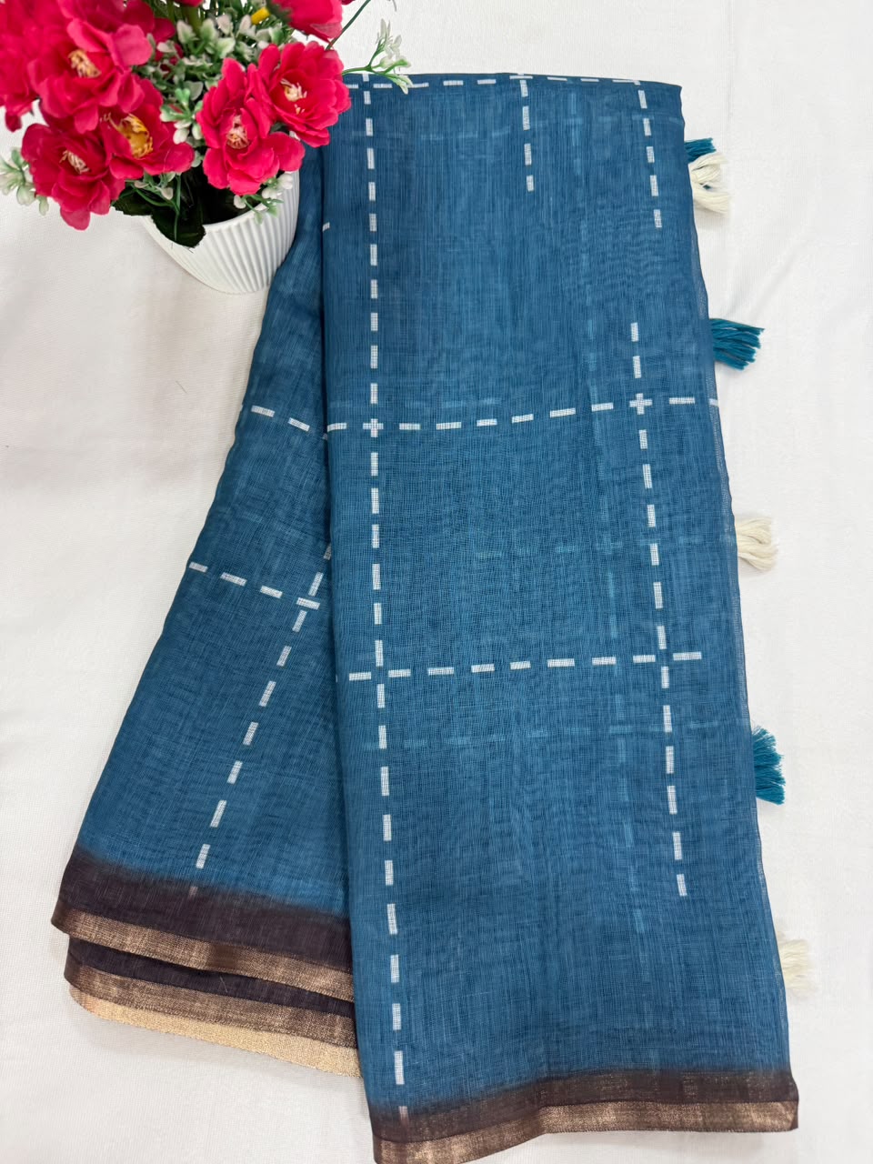 Teal blue tulip embroidery saree close-up