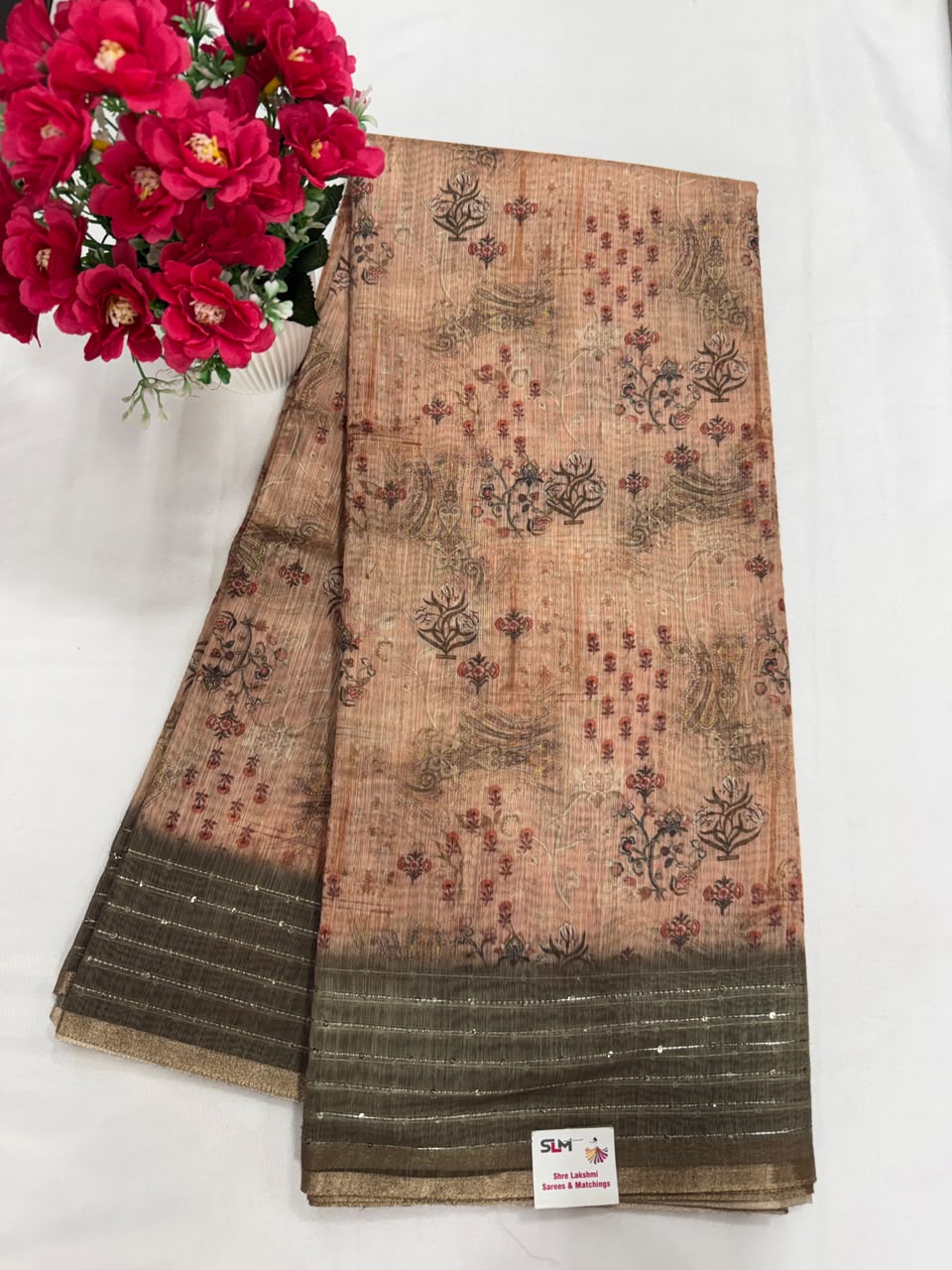 Rose pink ikat geometric print saree close-up
