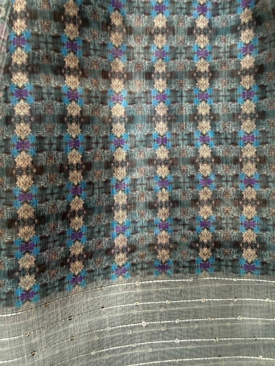 Slate blue folklore tribal print saree sequin border close-up