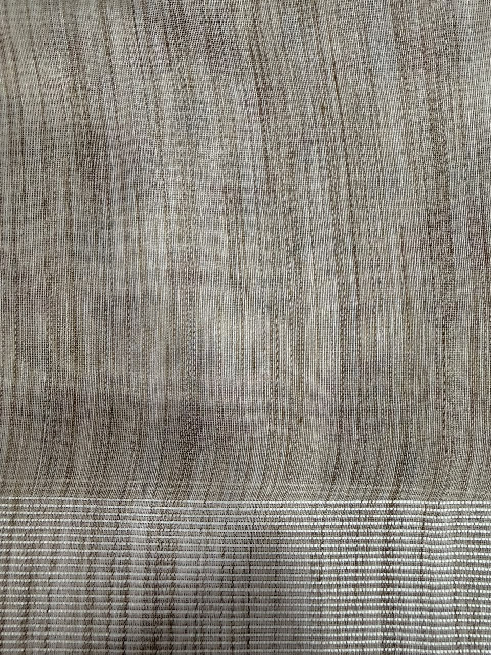 Brown kantha cross stitch grid saree close-up fabric and pattern