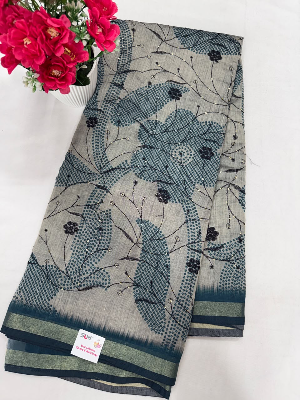 Grey blue rose floral print saree close-up fabric