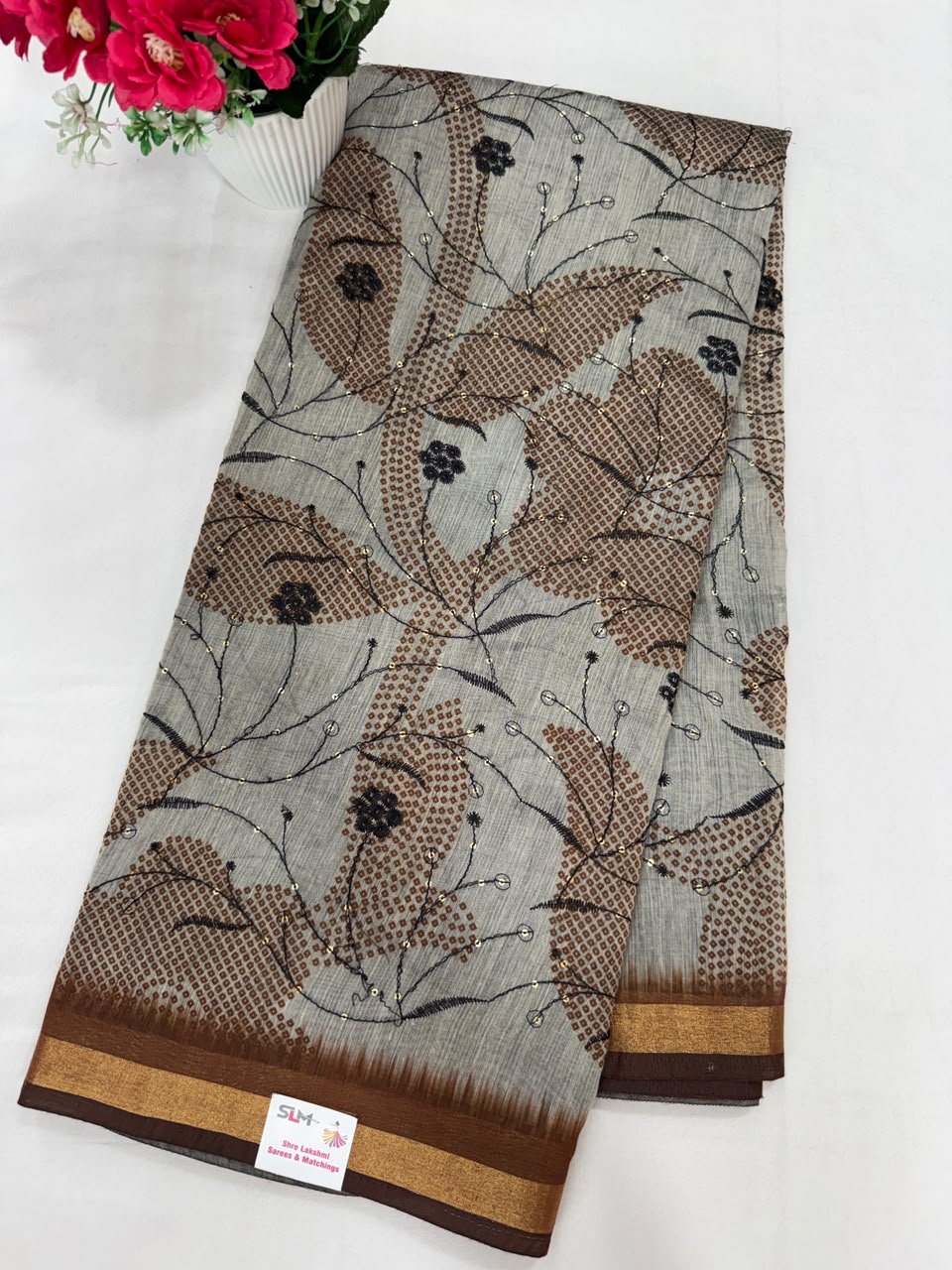 Grey blue peacock and bird print saree close-up buta motif