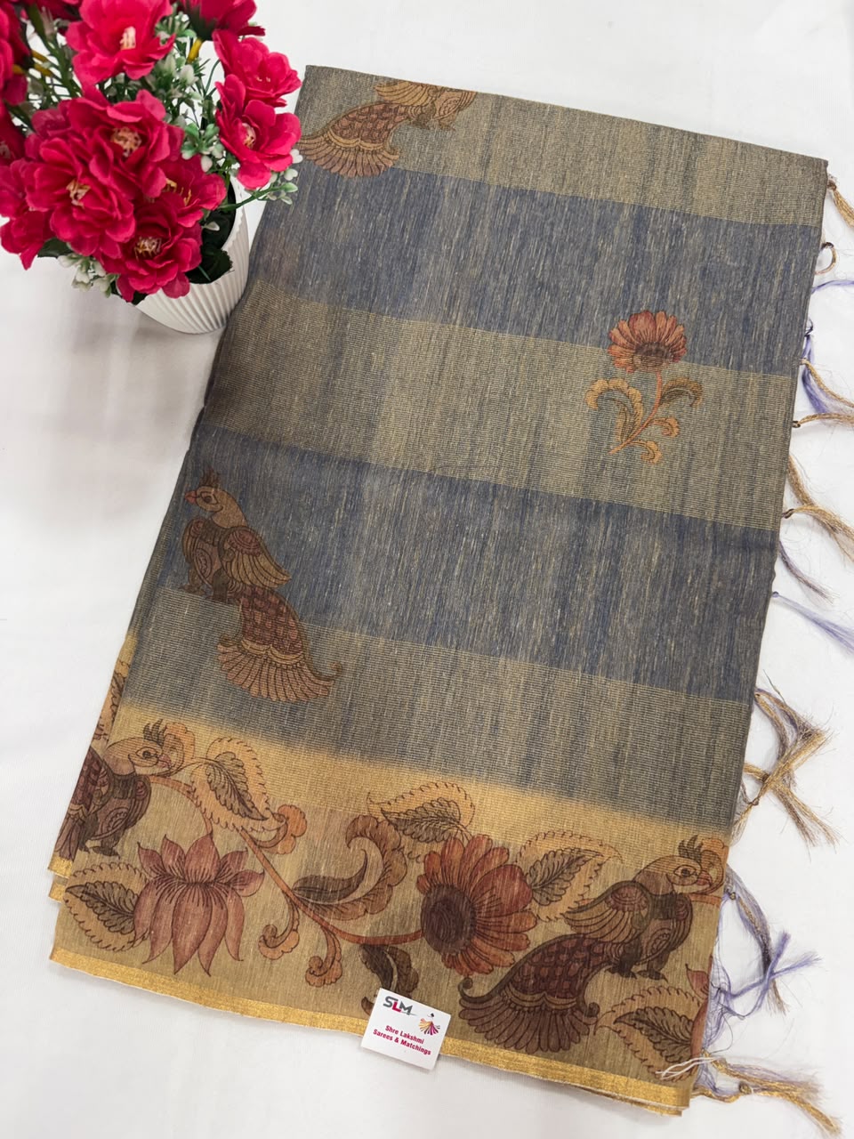 Grey dark green bandhani leaf print with black embroidery saree close-up