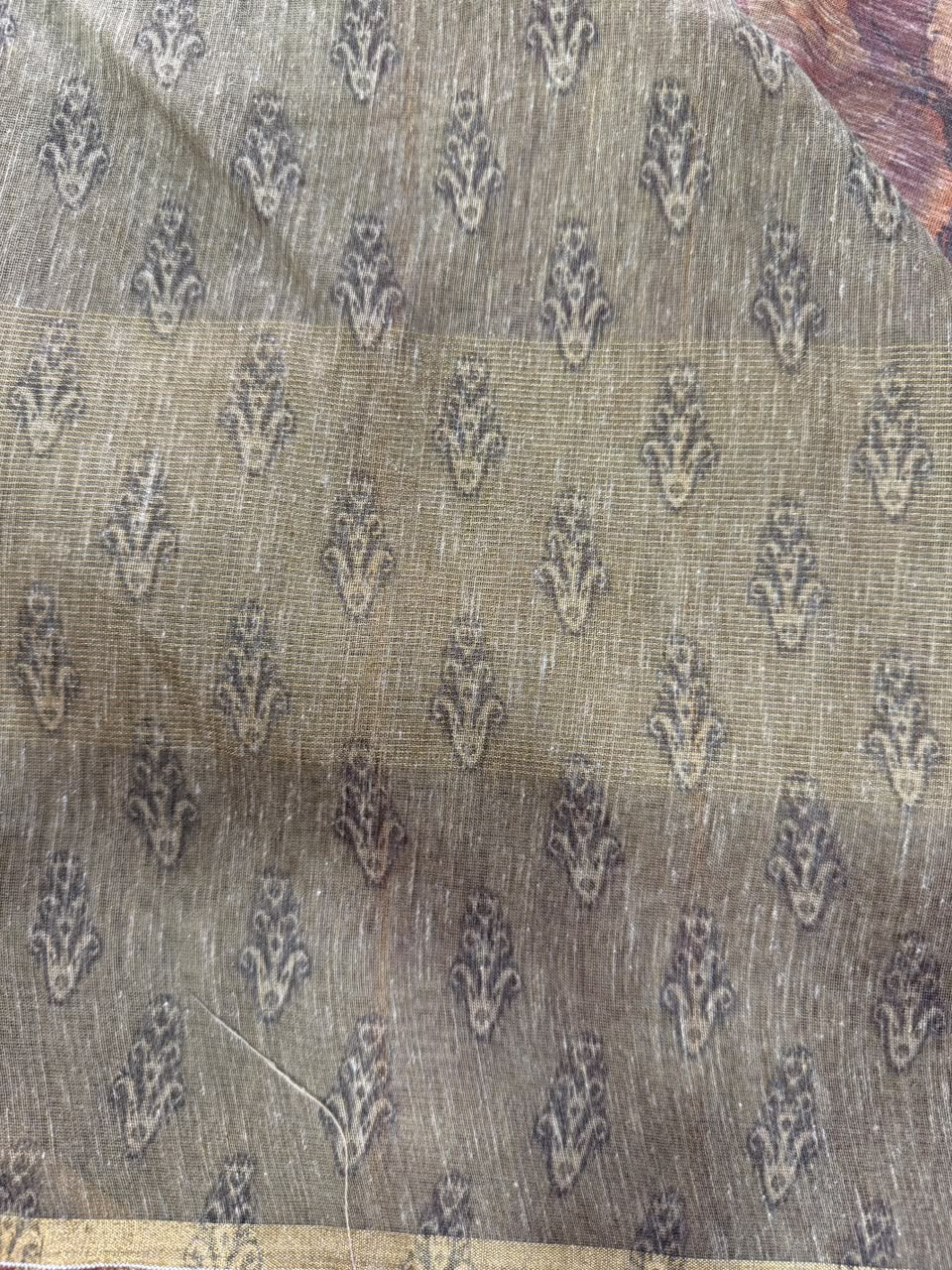 Olive green buta motif saree close-up fabric
