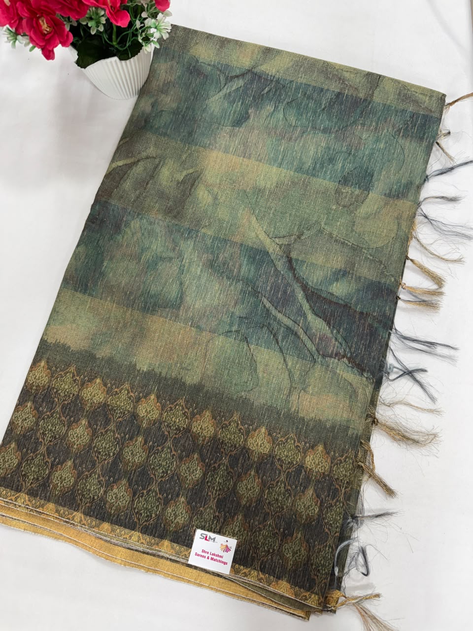 Green marble print saree full view with dark zari border